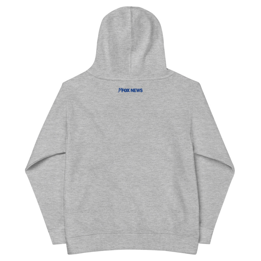 Close-up of the crisp FOX News Breaking News graphic on the front of a white kids hooded sweatshirt.