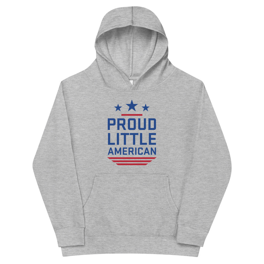 A young child wearing the *FOX News* Proud Little American kids hoodie in a clean, sunny American backyard.