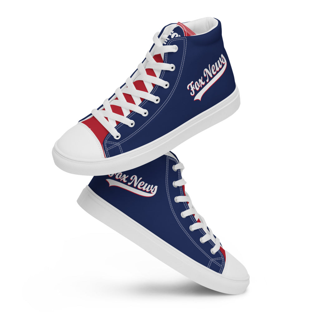 Angled lifestyle shot of the FOX News canvas shoes resting against a modern suburban living room backdrop.