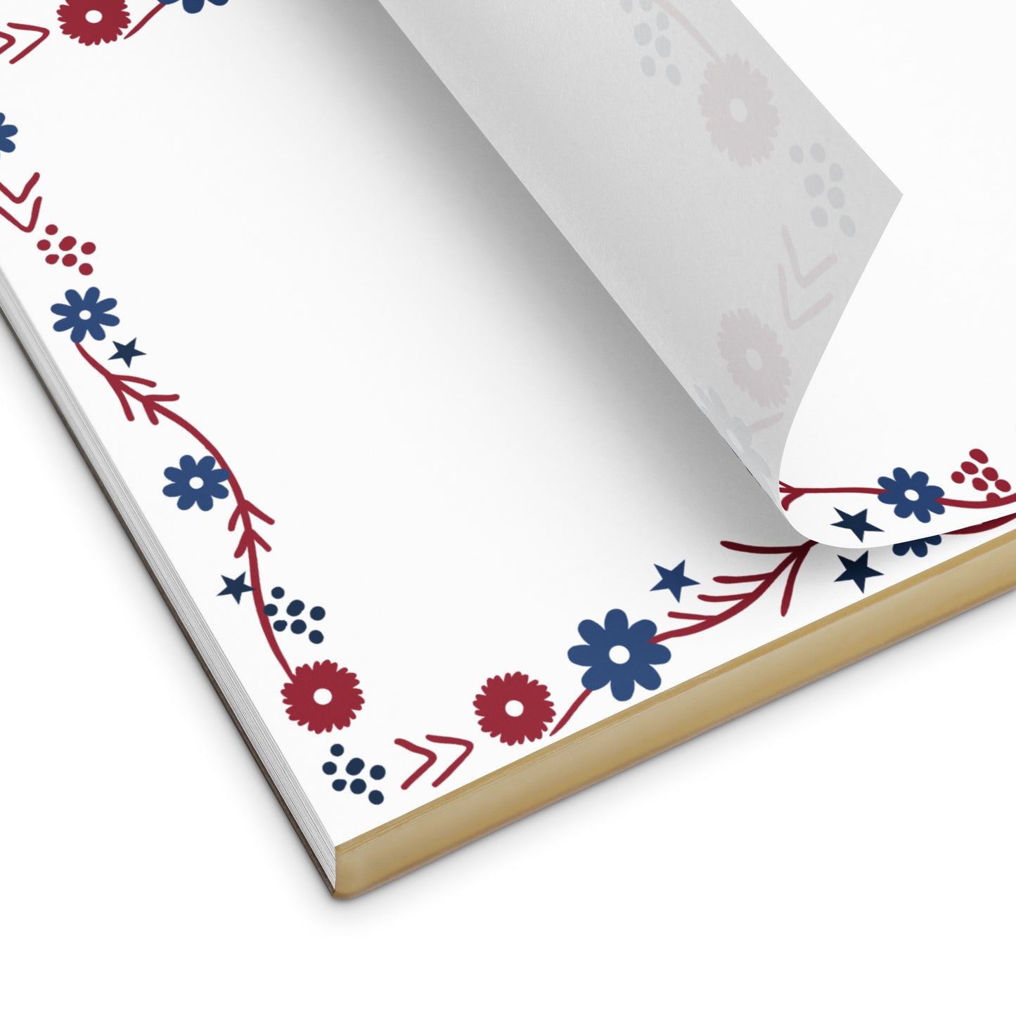 A magnetic FOX News Proud American Mom notepad attached to a stainless steel refrigerator in a suburban home.