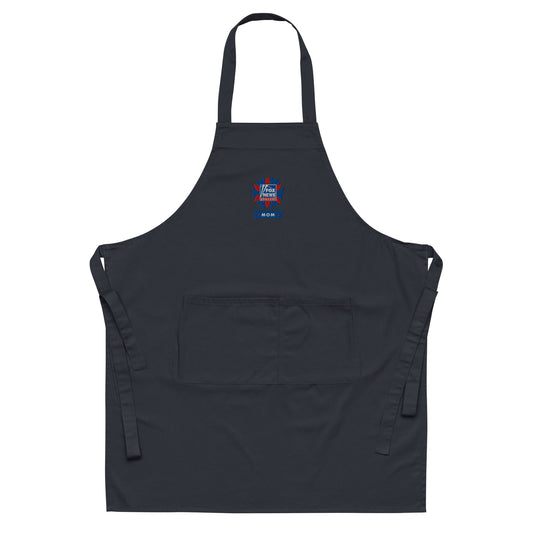 A modern American kitchen setting showcasing the navy FOX News Proud American Mom embroidered apron neatly displayed.