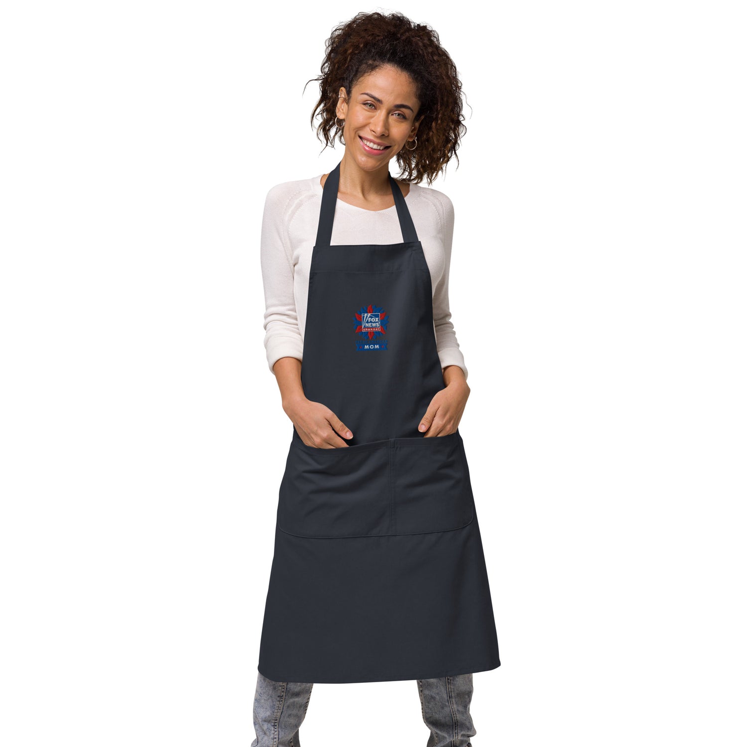 A patriotic kitchen counter setup featuring the FOX News embroidered apron hanging neatly.