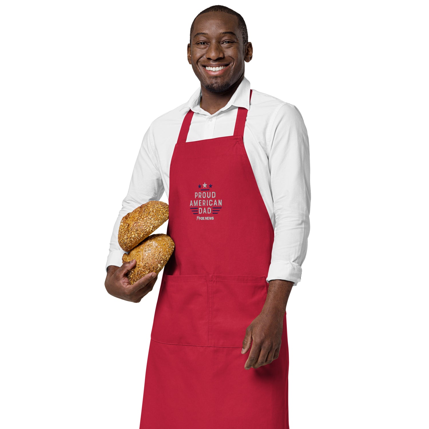 Side angle view of the embroidered apron showing adjustable straps and secure fit