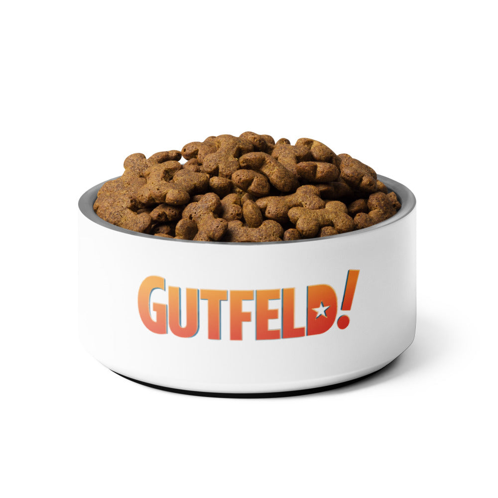 The *Gutfeld!* pet bowl placed neatly in a warm, traditional American home environment.