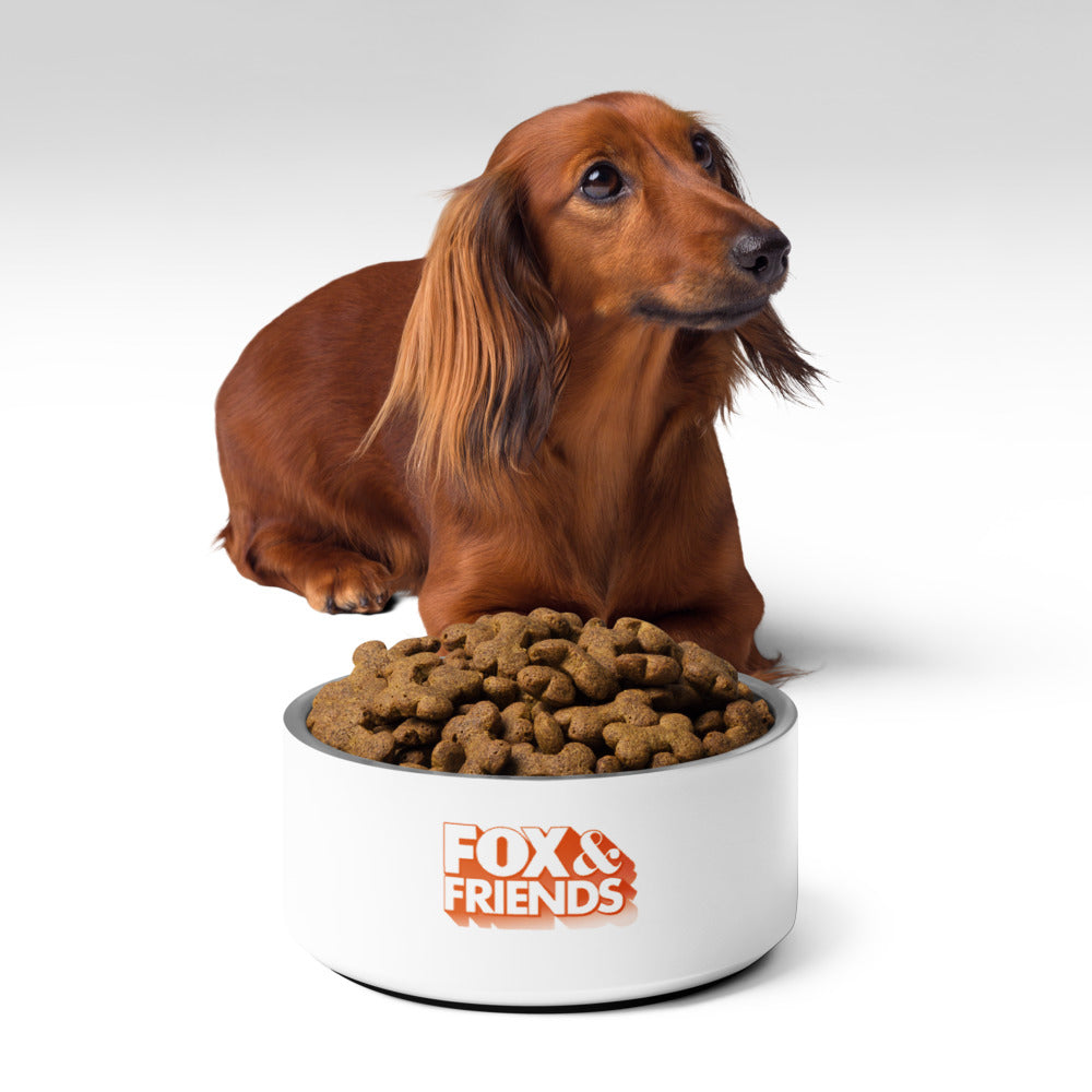 A patriotic pet-themed display featuring the FOX & Friends pet bowl alongside classic American decor.