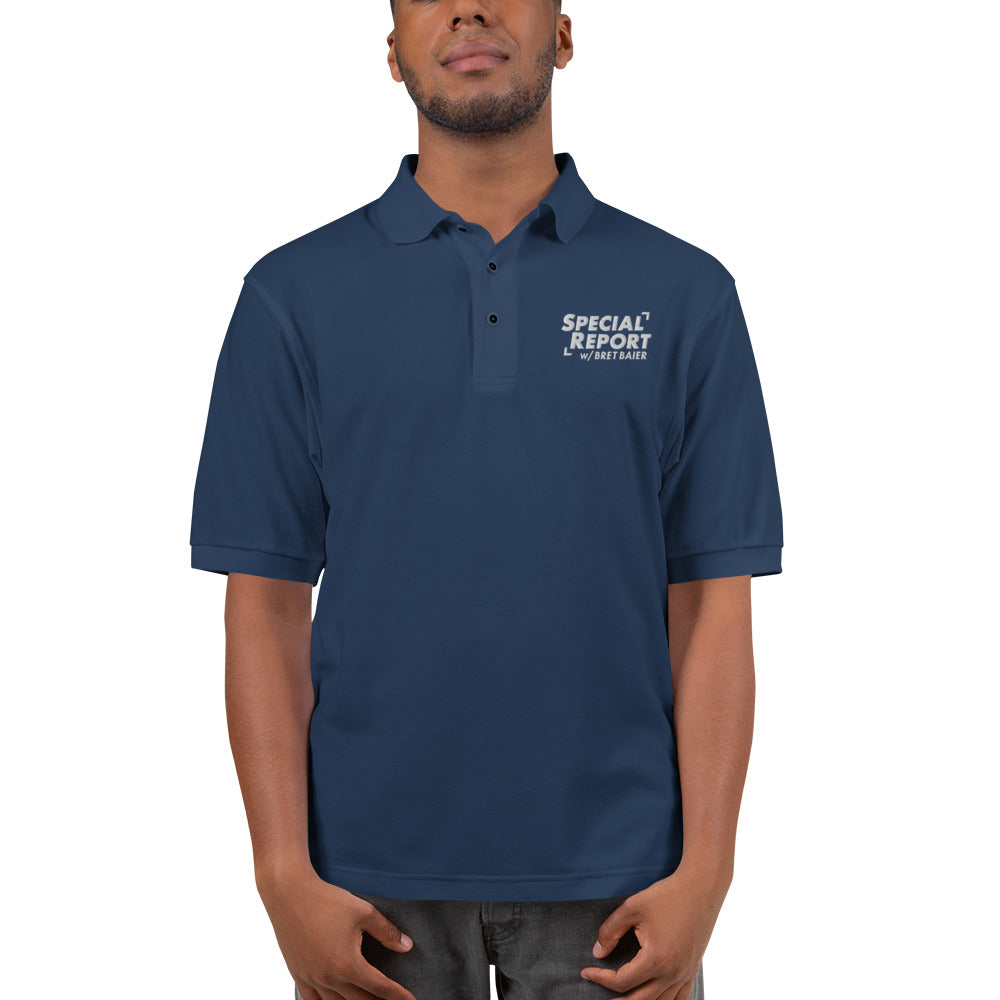Close-up of the Red *Special Report with Bret Baier* polo shirt showing the crisp show logo embroidery on the chest.
