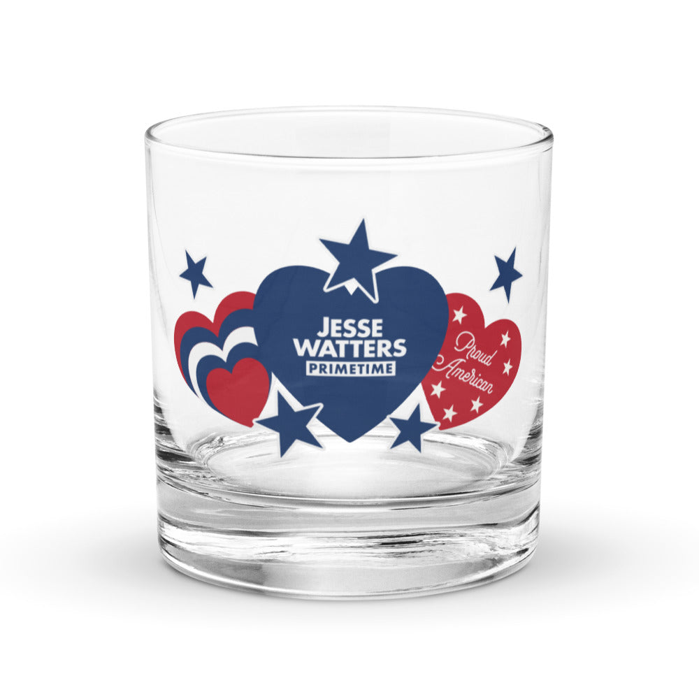 A high-quality 10.5 oz rocks glass featuring the FOX News Jesse Watters Primetime Proud American hearts and stars logo in a clean American home setting.