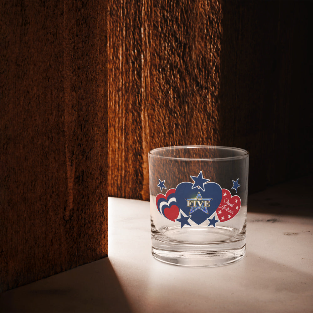 A side view of the clear drinking glass highlighting its durable construction and FOX News license.
