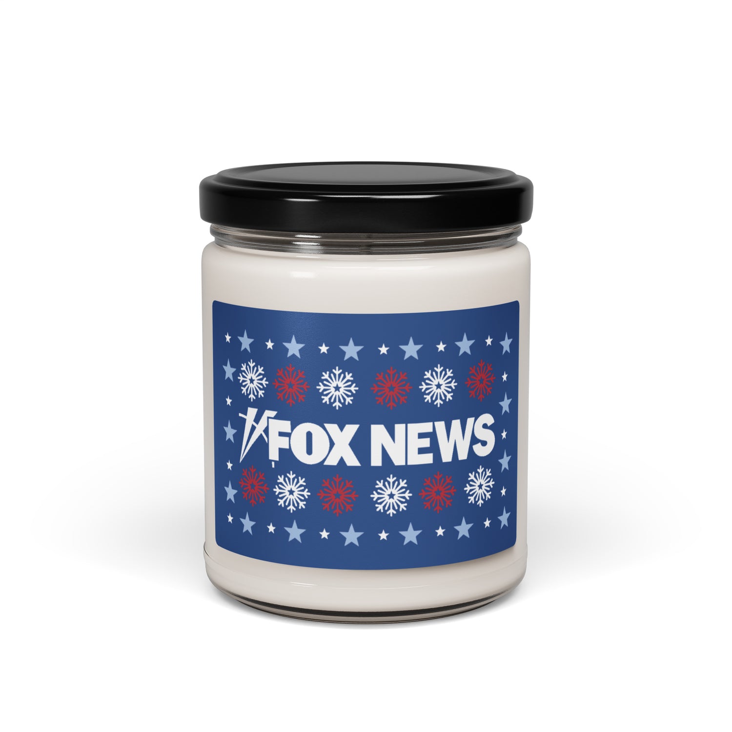 A cozy, modern American living room decorated for the holidays with a FOX News holiday snowflakes scented candle sitting on a wooden coffee table.