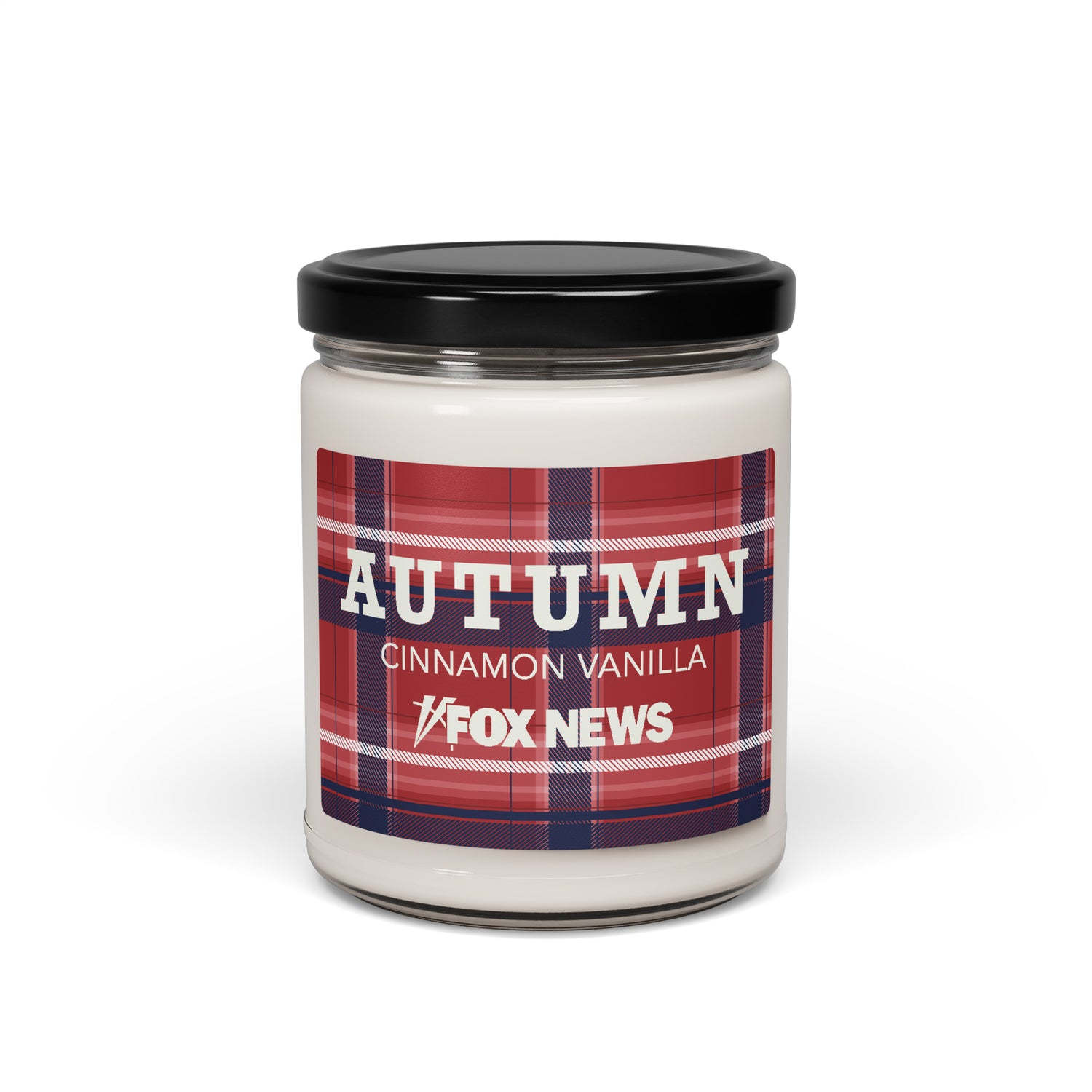 The FOX News Autumn Scented Candle in Apple Harvest scent placed in a clean, modern kitchen setting.