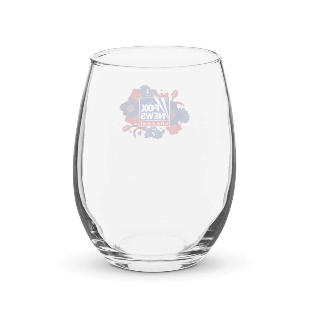 Lifestyle product view of the FOX News stemless wine glass filled with red wine during a quiet evening at home.