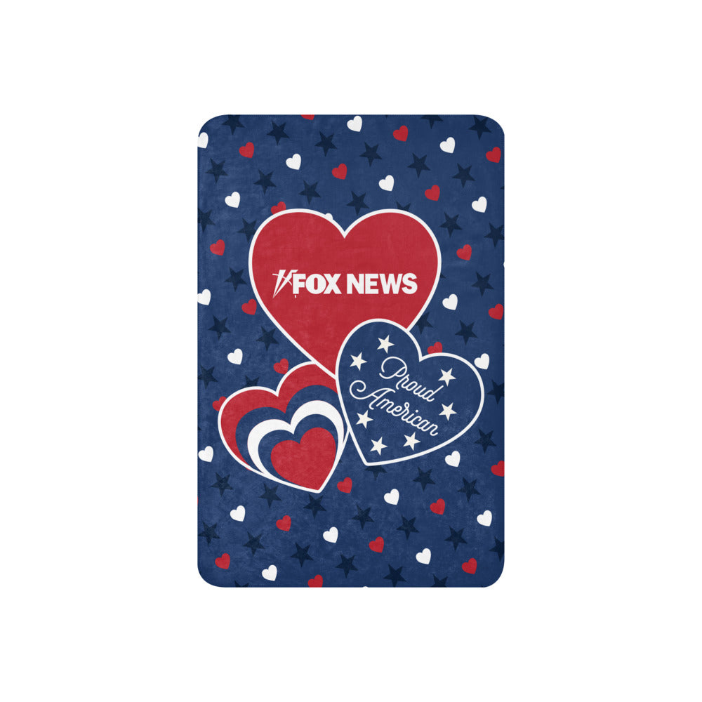 The soft Sherpa fleece lining of the FOX News Proud American Blanket shown in a clean American home setting.