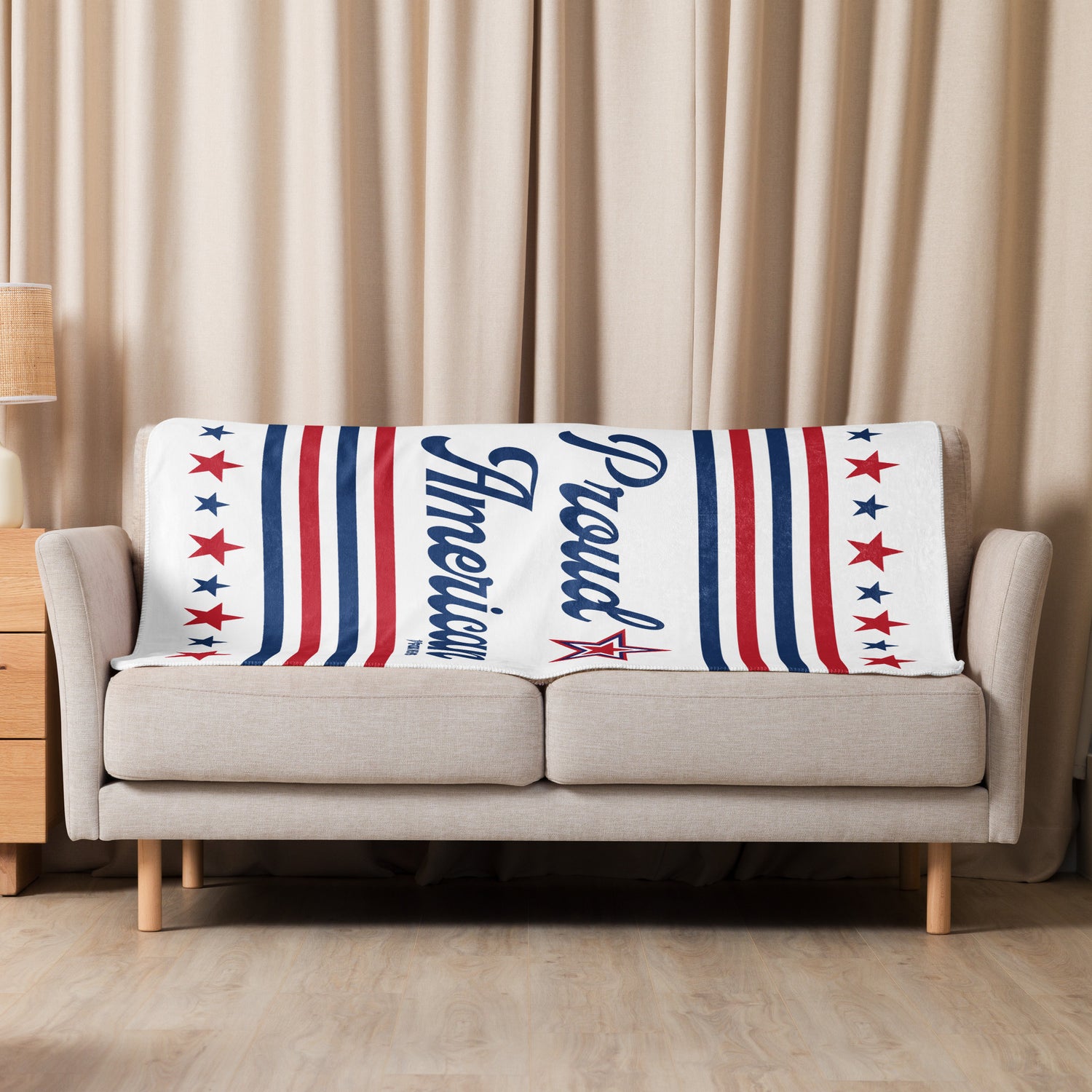 The FOX News Sherpa Blanket folded neatly to showcase the vibrant patriotic design elements.