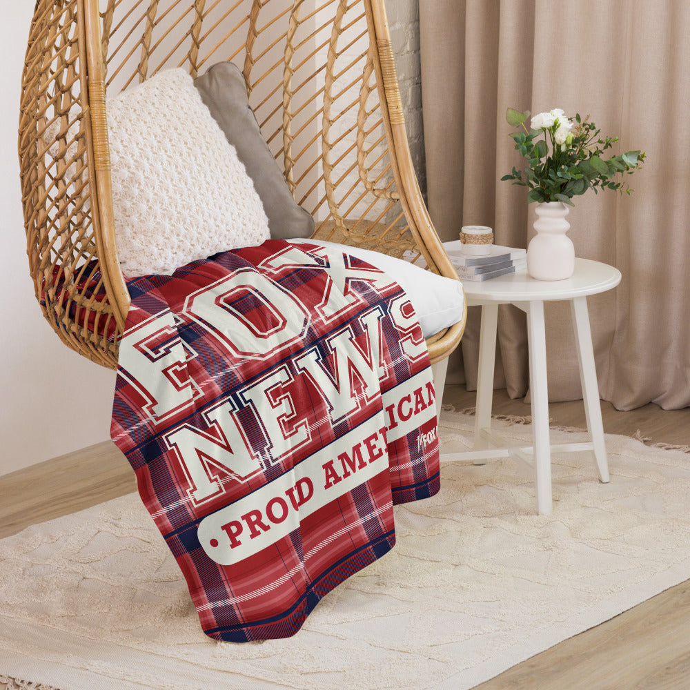 The crisp *FOX News* logo and *Proud American* graphic presented on a soft white blanket.