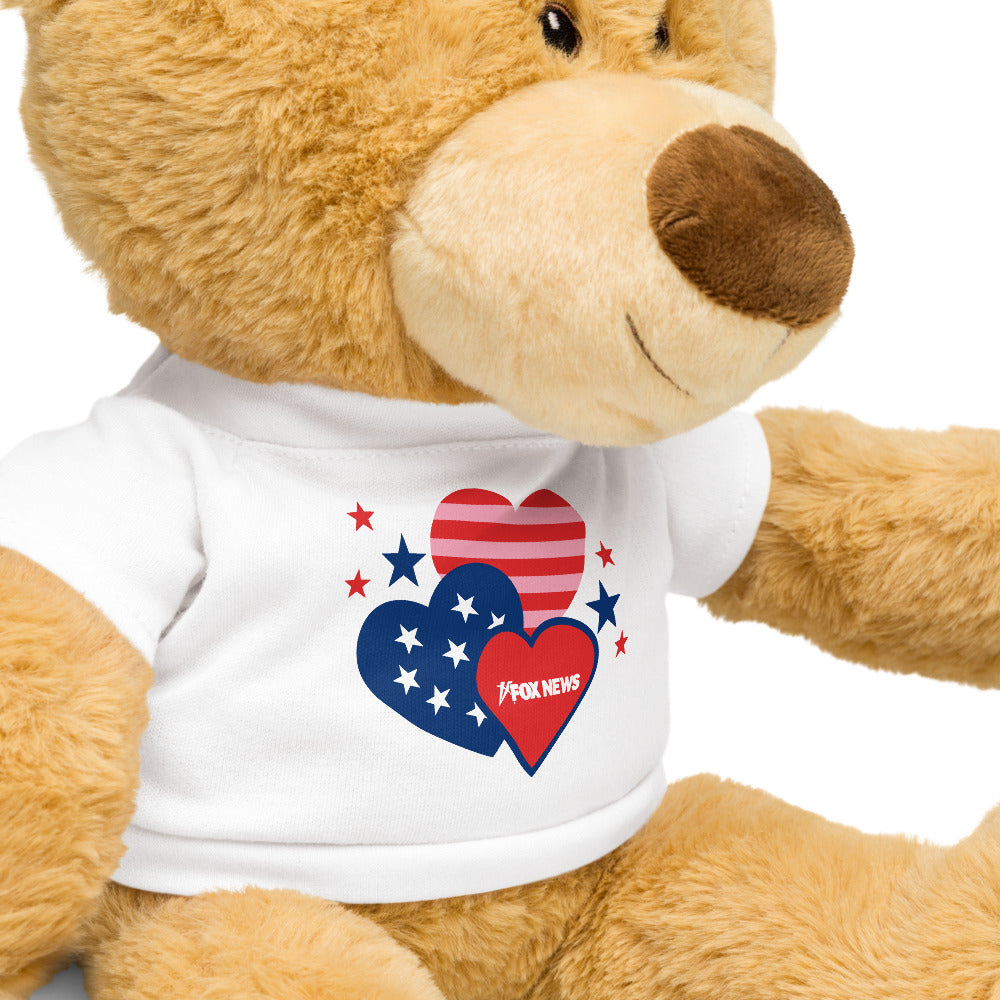 Close-up of the patriotic hearts design and *FOX News* logo on the collectible plush bear.