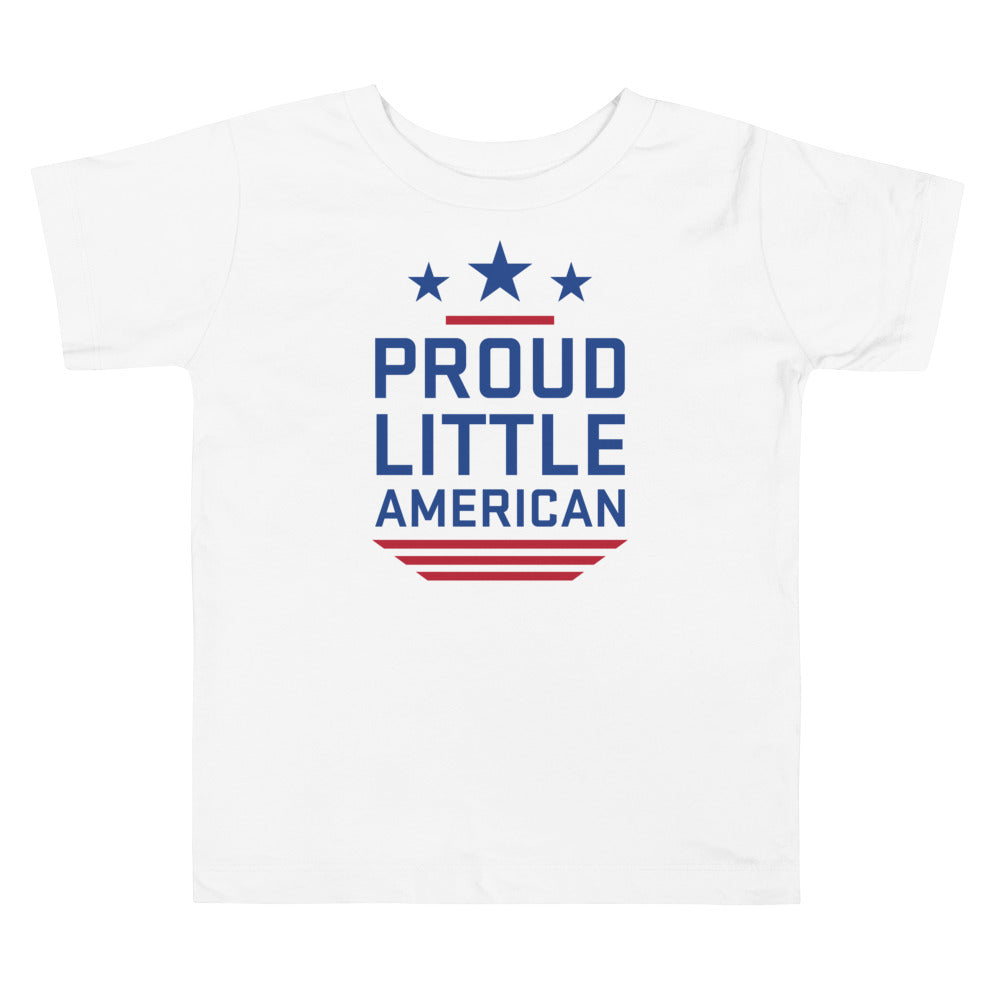 A white toddler t-shirt featuring the FOX News Proud Little American graphic in a clean American home setting.