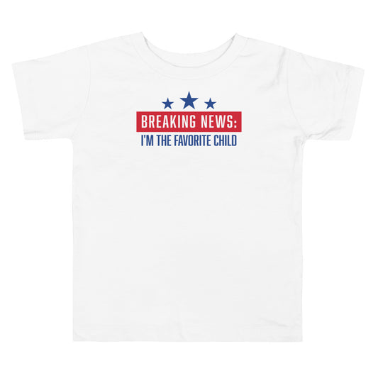 A front view of the white FOX News Breaking News Toddler T-Shirt featuring a crisp FOX News logo and bold red Breaking News graphic.
