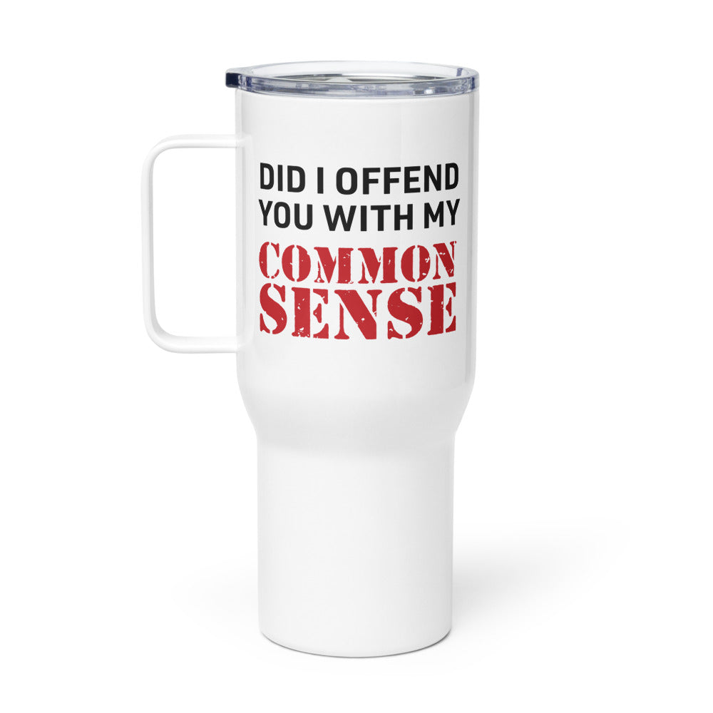 *FOX News @ Night* Common Sense Travel Mug showing the bold logo and text on a stainless steel finish in a modern American kitchen.