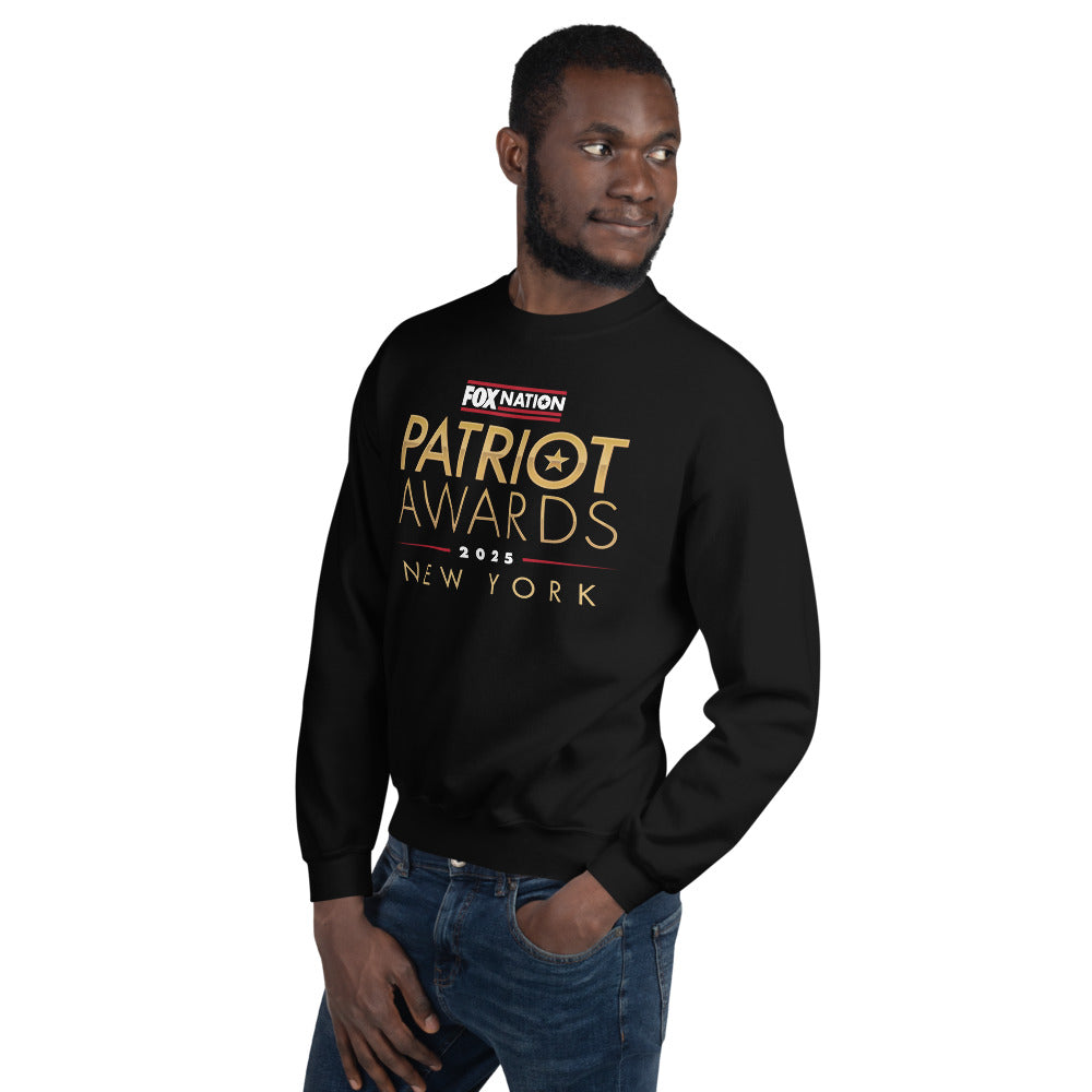 Close-up of the crisp FOX Nation logo and Patriot Awards 2025 graphic on the front of the black crewneck sweatshirt.