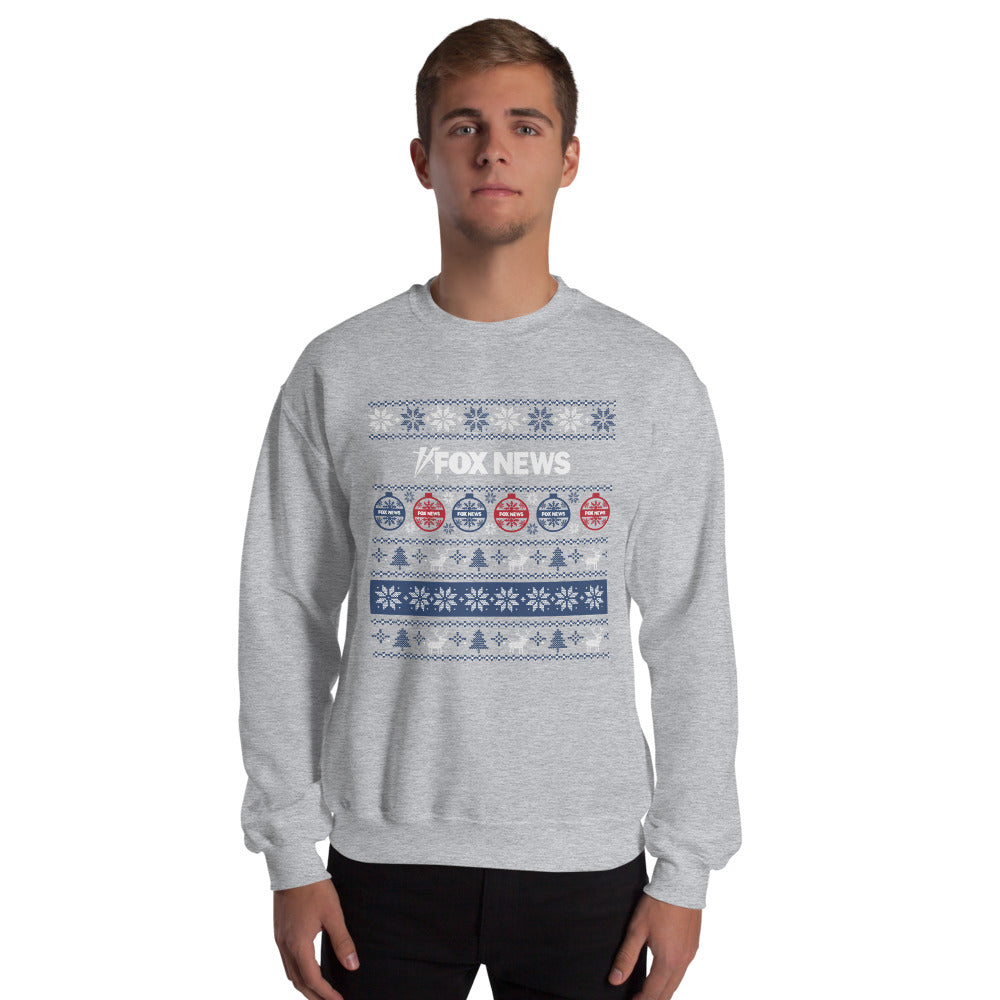 A loyal viewer wearing the FOX News Holiday Crewneck Sweatshirt while enjoying a morning coffee in a comfortable backyard setting.