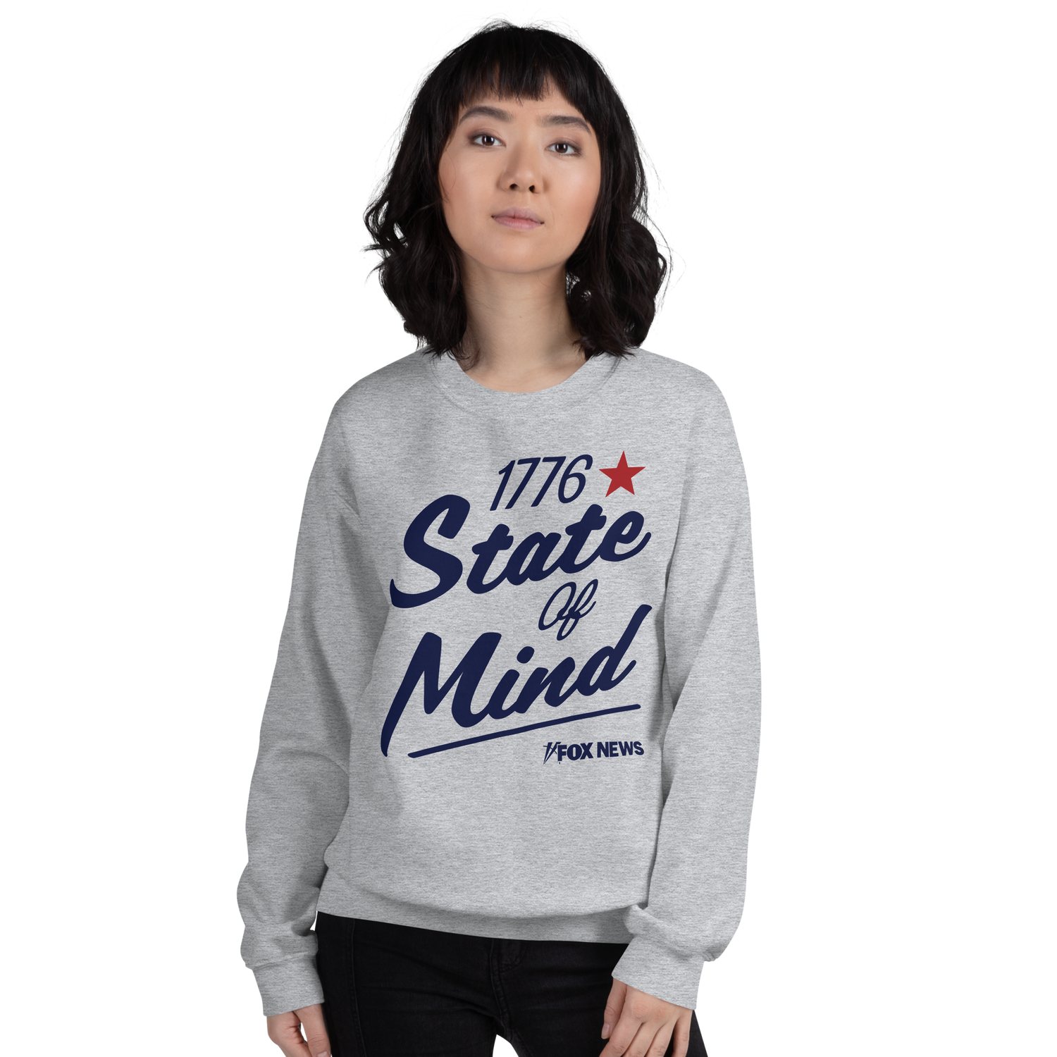 The crisp 1776 State Of Mind logo displayed clearly on the front of a navy FOX News sweatshirt.