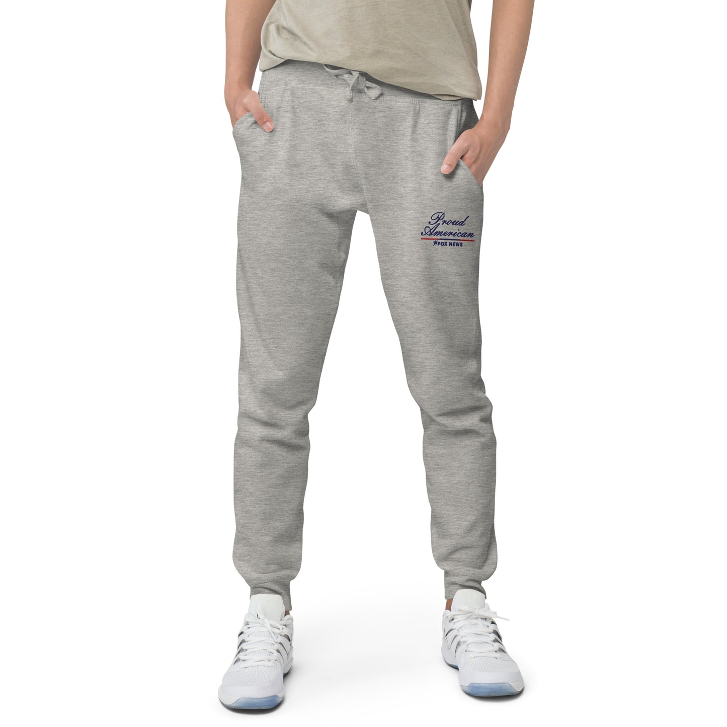 A lifestyle shot showcasing the relaxed fit and durable construction of the FOX News Proud American sweatpants in a clean home environment.