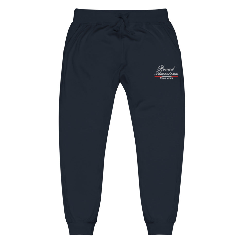 A close-up shot highlighting the crisp embroidery of the FOX News logo and Proud American graphic on the sweatpants fabric.
