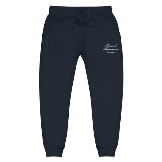 A close-up shot highlighting the crisp embroidery of the FOX News logo and Proud American graphic on the sweatpants fabric.