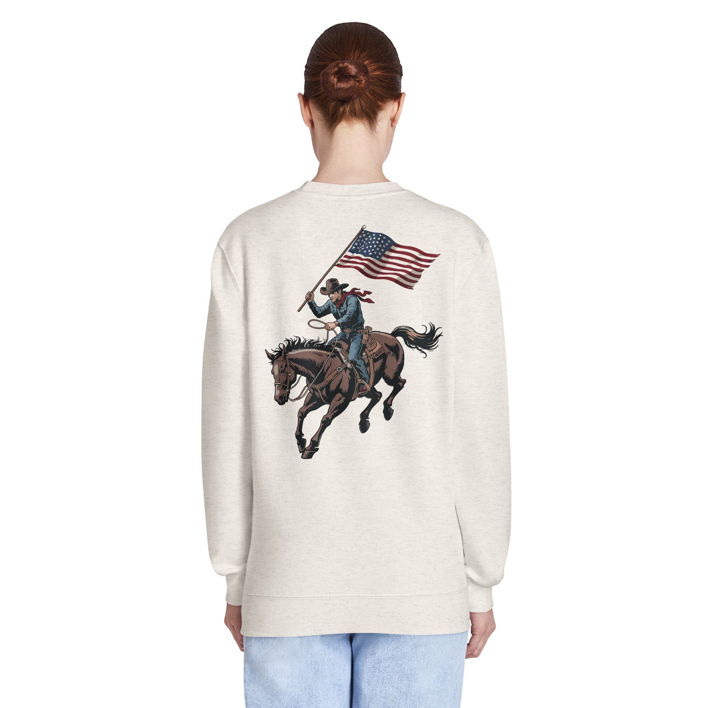 Lifestyle shot of a patriot wearing the sweatshirt outdoors against a scenic American backdrop