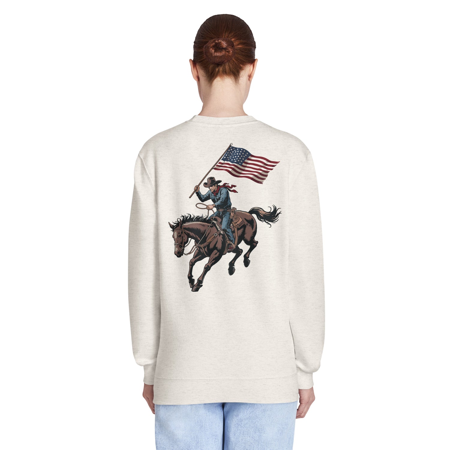 Lifestyle shot of a patriot wearing the sweatshirt outdoors against a scenic American backdrop