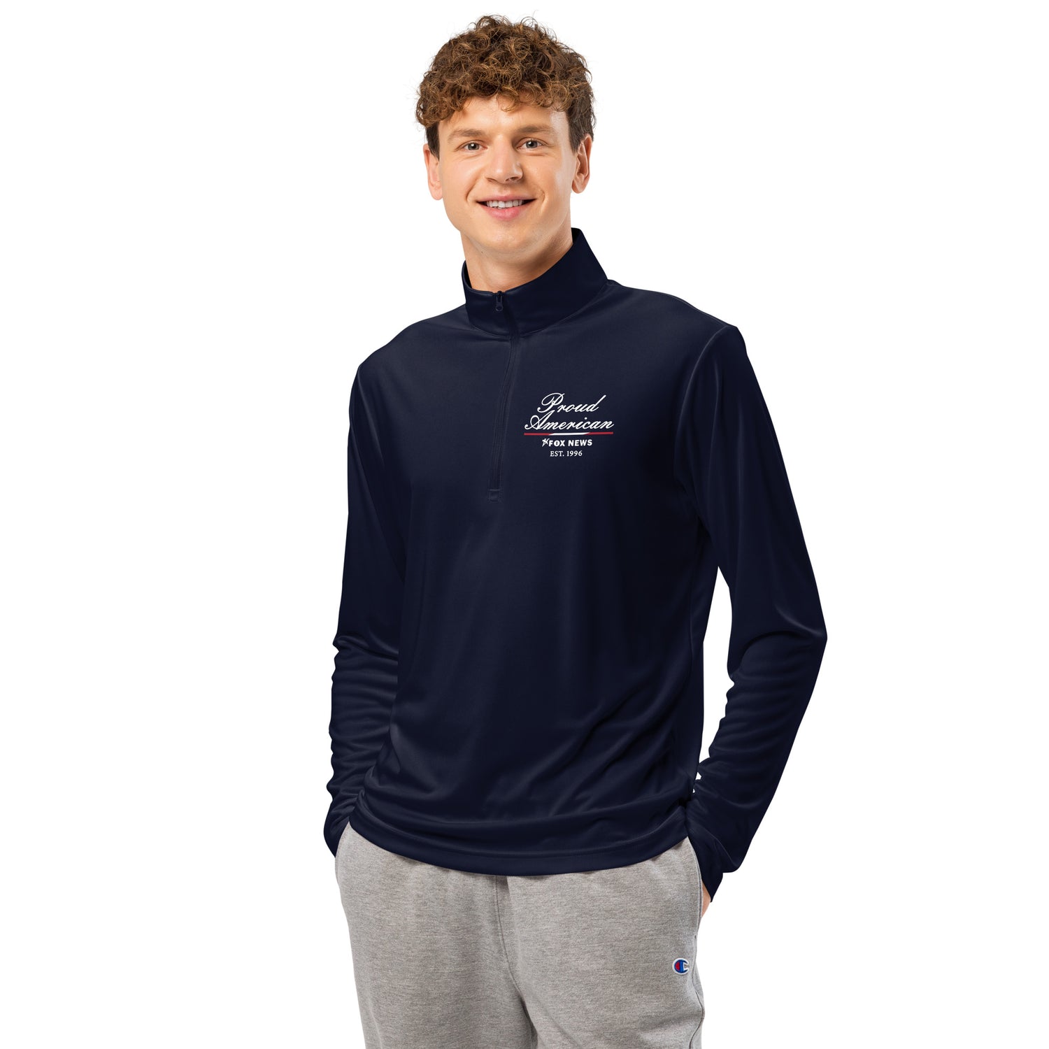 Detail shot of the quarter-zip collar and durable zipper hardware on the Iron Grey pullover.