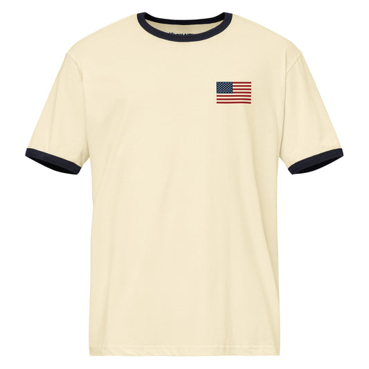 Close-up of the chest graphic on the white ringer t-shirt, displaying the bold Fox News logo and America Looks Good On Me lettering