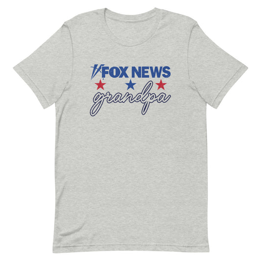A modern American living room with a grandfather wearing the FOX News Grandpa T-Shirt, relaxing comfortably.