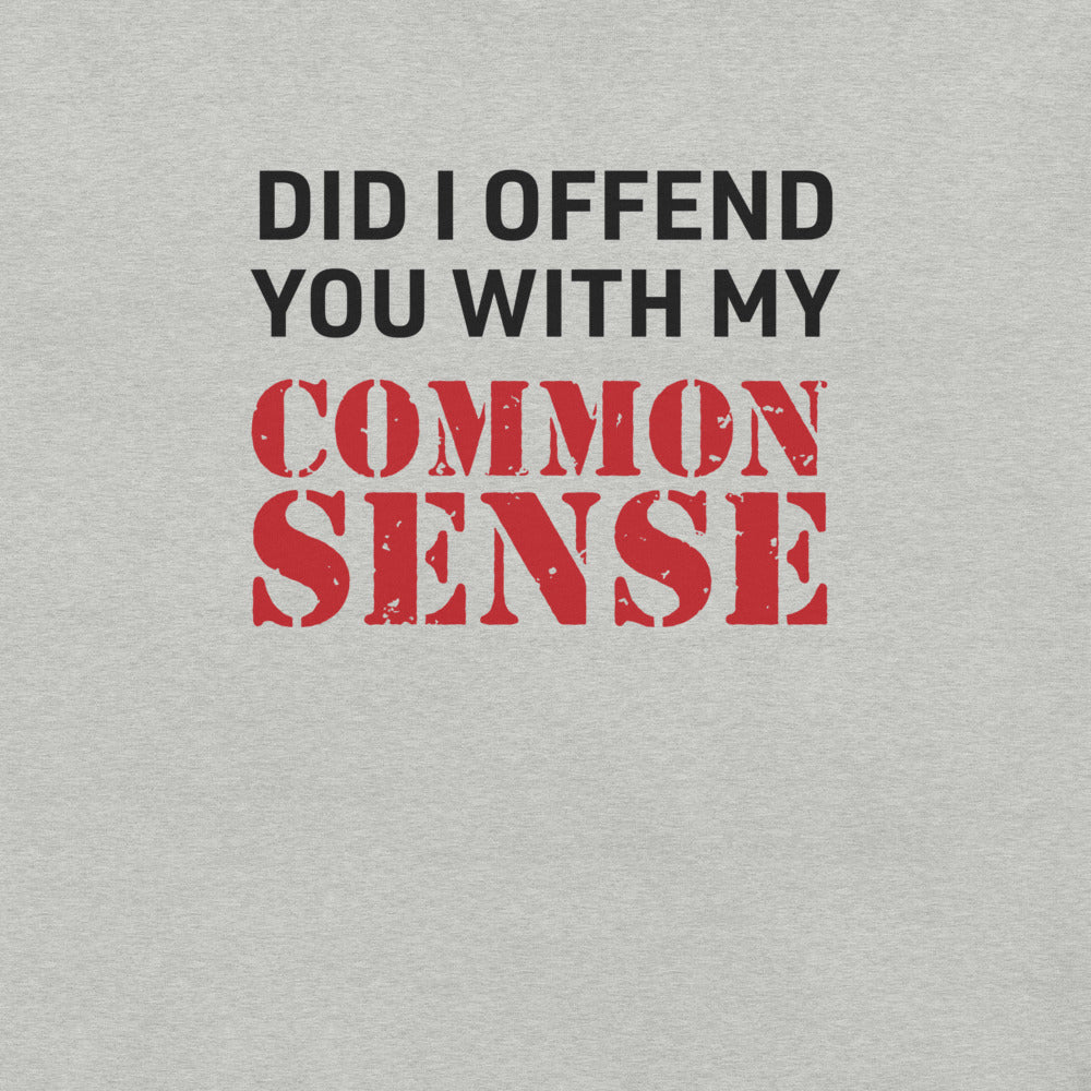 A clean, folded FOX News @ Night Common Sense T-Shirt on a wooden table in a bright home.