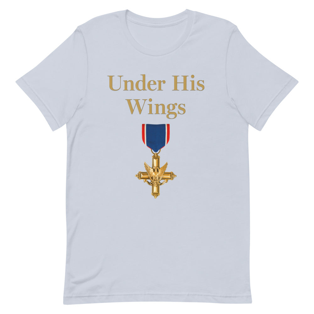 A patriotic American standing in a bright, suburban backyard holding a morning coffee while wearing the Light Blue FOX News Under His Wings by Emily Compagno T-Shirt.