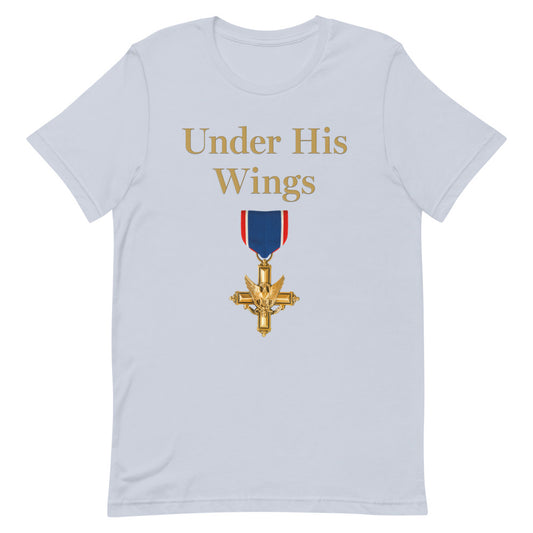 A patriotic American standing in a bright, suburban backyard holding a morning coffee while wearing the Light Blue FOX News Under His Wings by Emily Compagno T-Shirt.