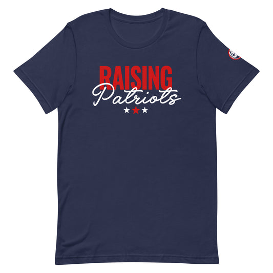A proud American father wearing the FOX News Raising Patriots T-Shirt in a clean backyard setting.