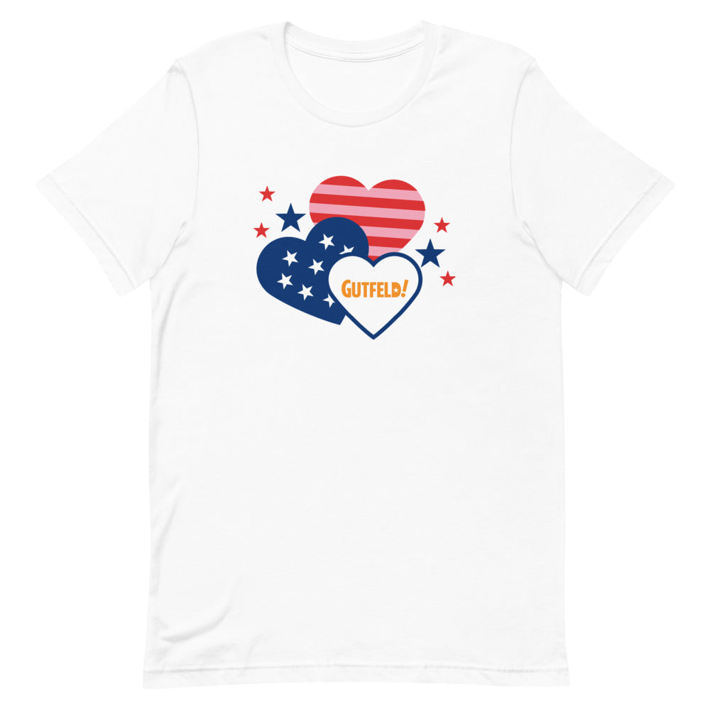 A person wearing the Gutfeld! Hearts T-Shirt in a suburban outdoor backyard setting.