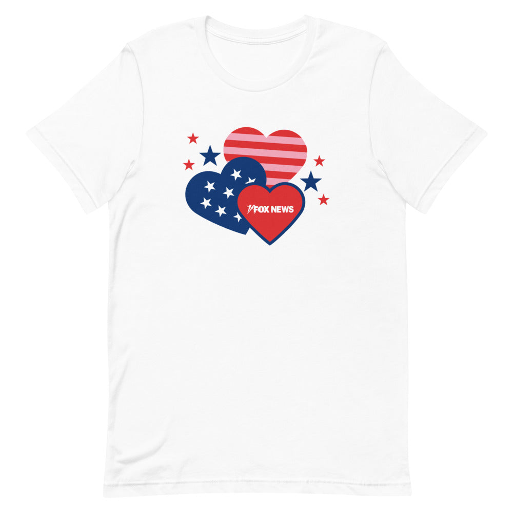 A Caucasian man standing in a suburban backyard setting wearing the *FOX News* Hearts T-Shirt, showcasing the relaxed and comfortable fit.