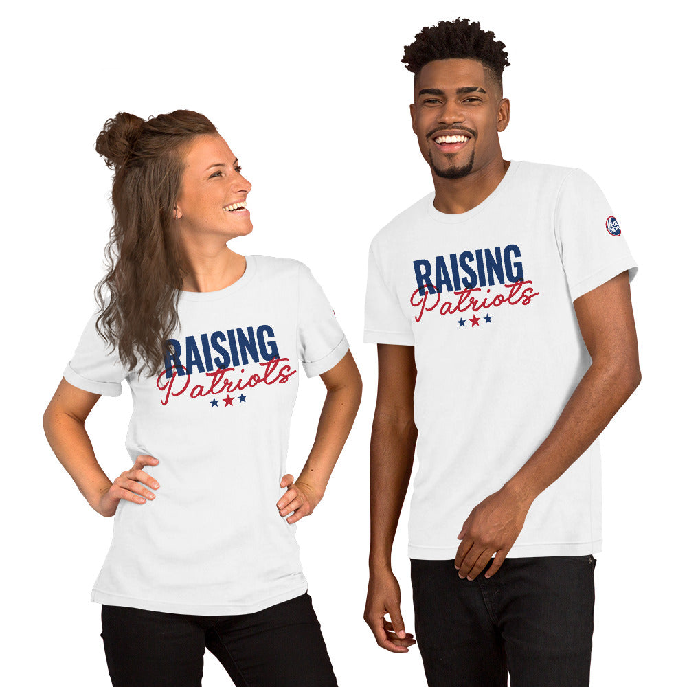 A patriotic American wearing the FOX News Raising Patriots T-Shirt in a bright outdoor lifestyle context.