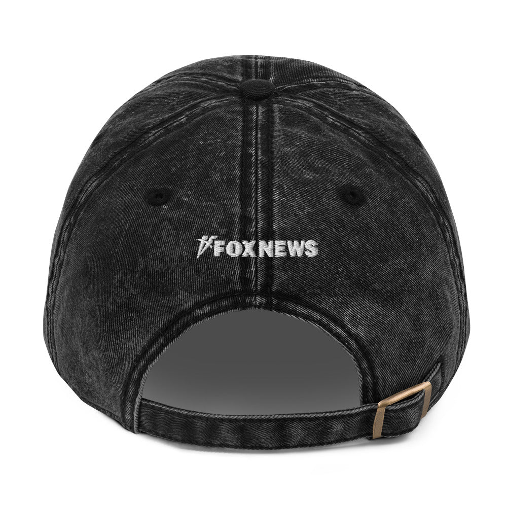 The FOX News Proud American Denim Hat displayed in a classic Americana home setting.