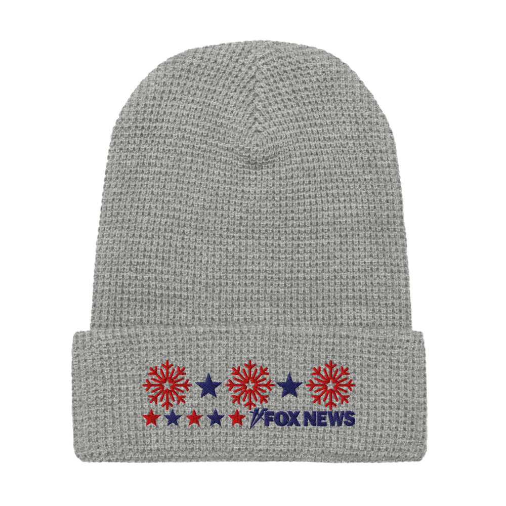 A Navy blue FOX News beanie featuring a crisp snowflake design and the official network logo.