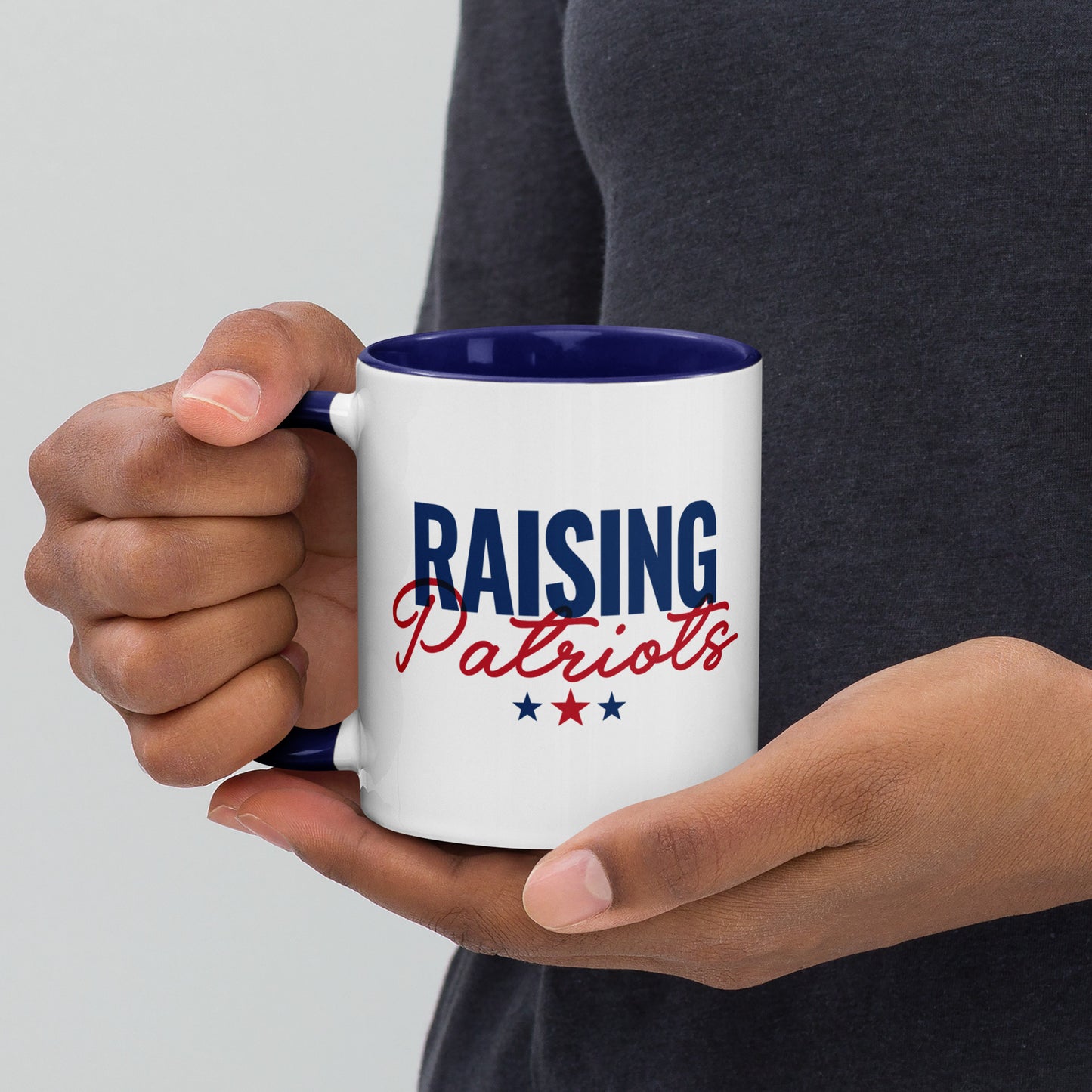 Product shot of the FOX News Raising Patriots Two-Tone Mug from the side angle highlighting the comfortable handle.