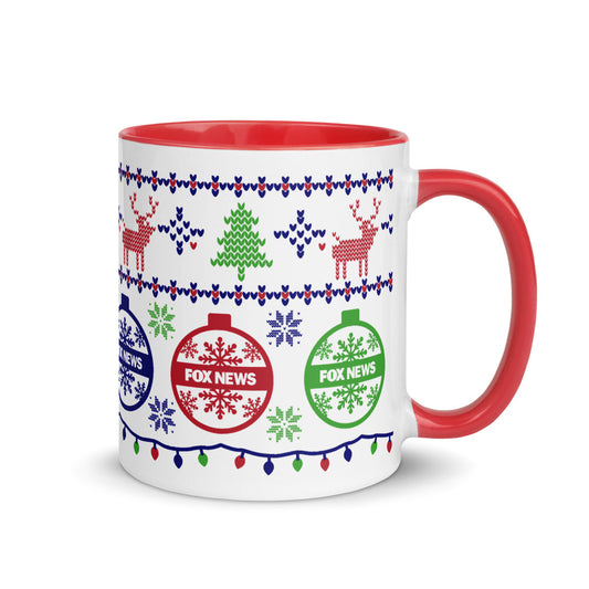 A close-up shot of the FOX News logo prominently displayed on the side of a two-tone ceramic holiday mug.