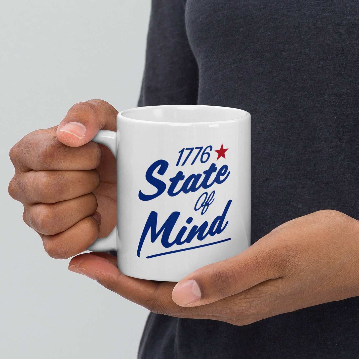 A bright kitchen counter setting displaying the FOX News ceramic coffee mug filled with steaming coffee.
