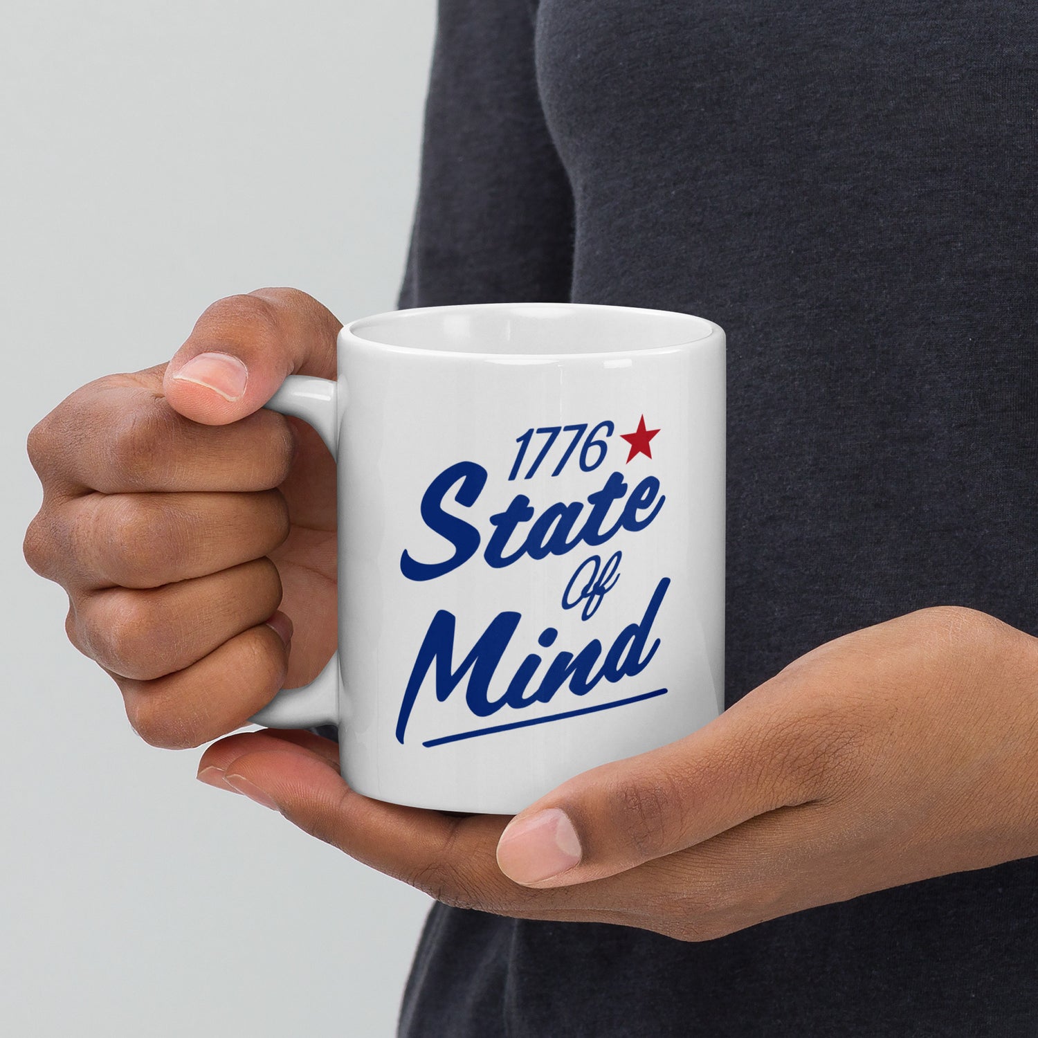 A bright kitchen counter setting displaying the FOX News ceramic coffee mug filled with steaming coffee.