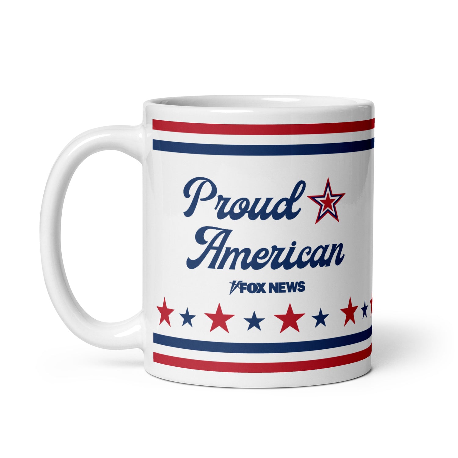 A crisp product shot of the FOX News Proud American white ceramic mug sitting upright on a clean, modern wooden kitchen table with morning sunlight.