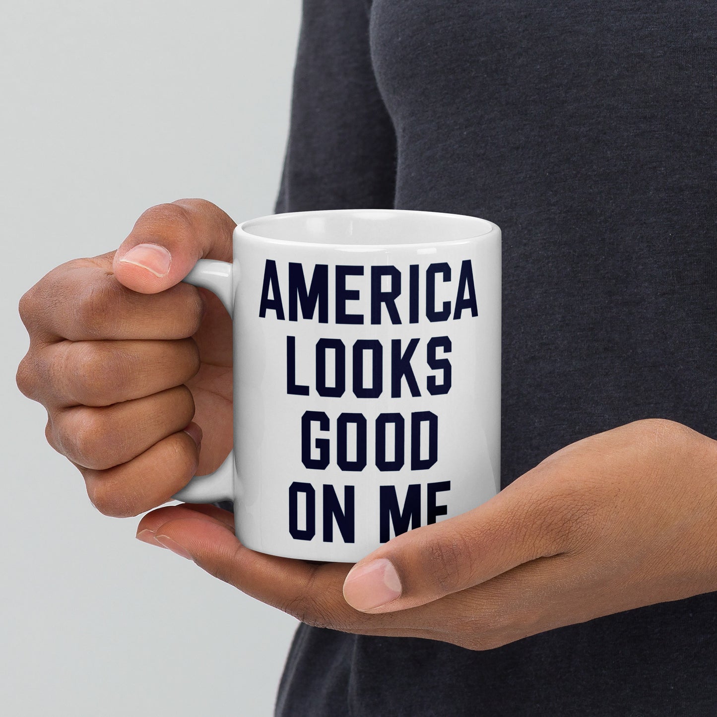 Side profile of the mug highlighting the sturdy handle and smooth ceramic finish