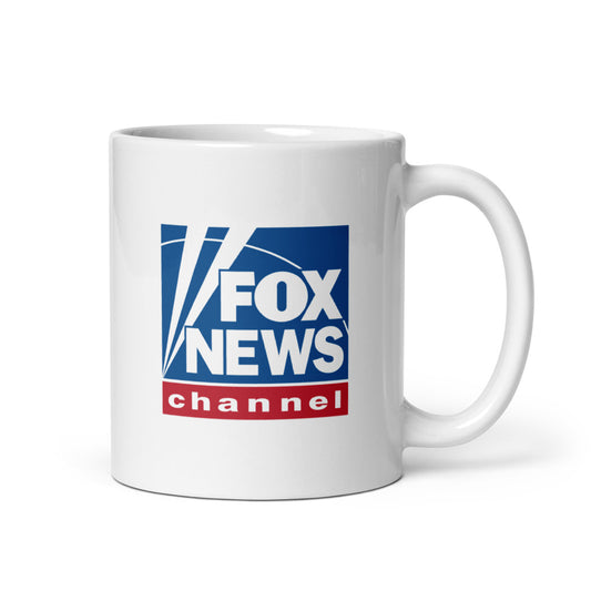 A 15 oz *FOX News* logo mug sitting on a clean kitchen counter in a modern American home.