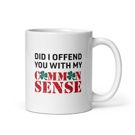 A modern American living room setting featuring the FOX News @ Night Common Sense Lucky Mug resting on a wooden coffee table.